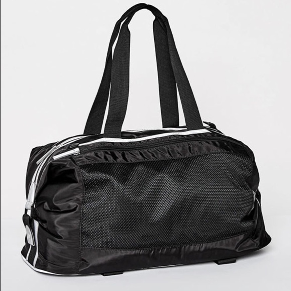 NWT- fabletics traverse bag- glow getter, black